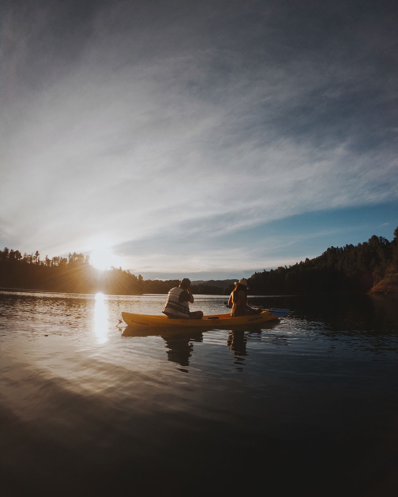 Person kayaking, adventure travel concept